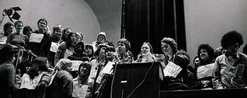 Lesbian demonstrators take over the stage at the tribunal